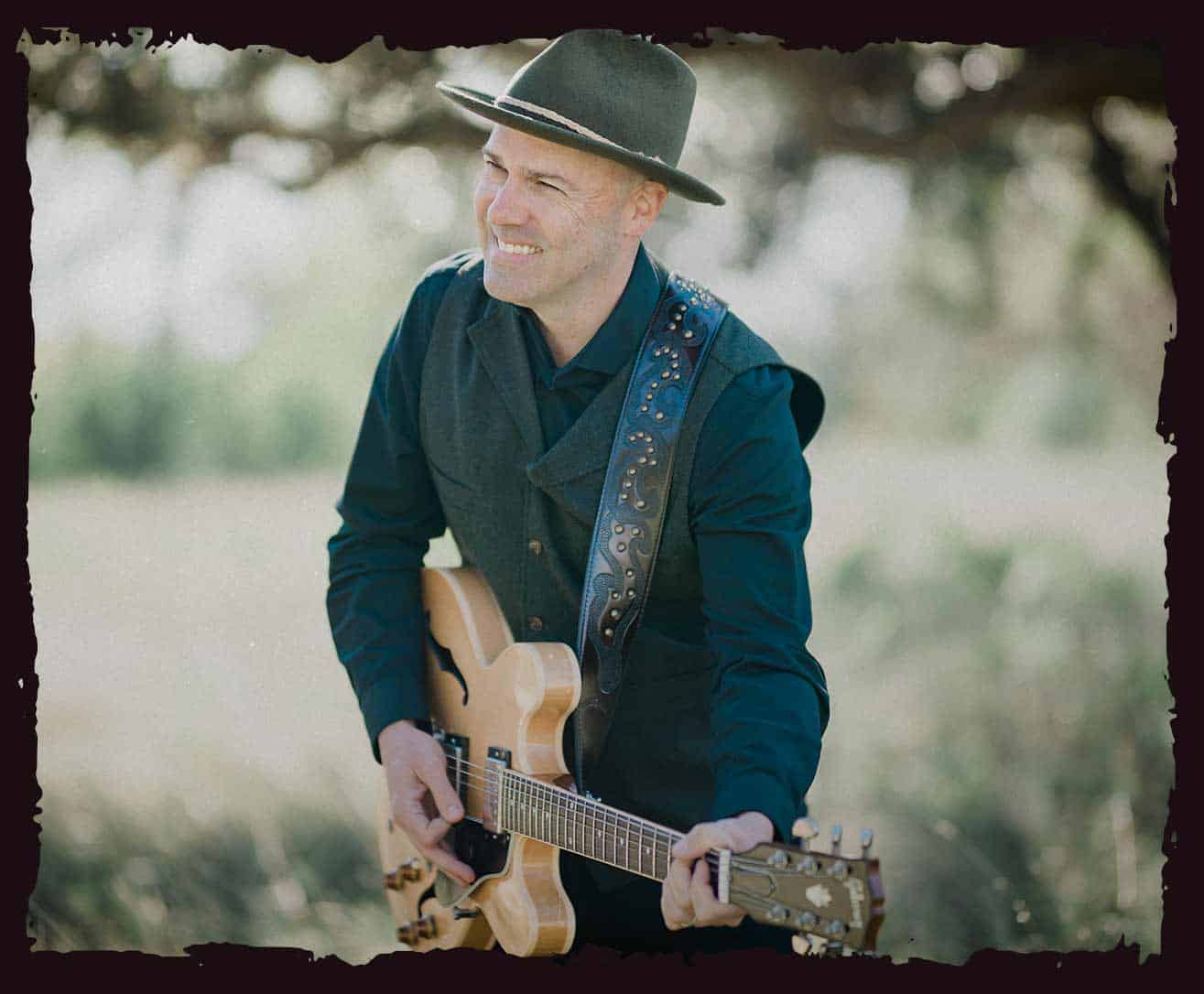 Barrett Simms with his Gibson ES-335 guitar